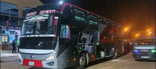 Grand Bus coach on a night highway